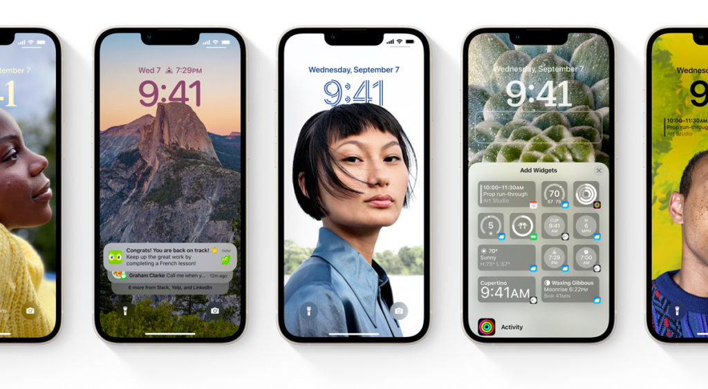 Row of iPhones showing different features of iOS 16 including lock screen wallpapers and widgets.